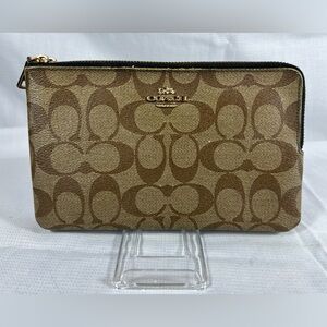 2052: Coach Monogram Clutch